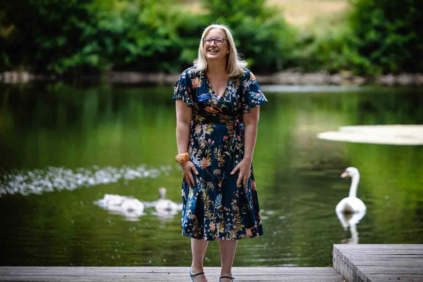 Deb Reed Celebrant based in Colchester Essex sitting smiling before a wedding.